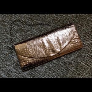 Rose gold faux snakeskin clutch
